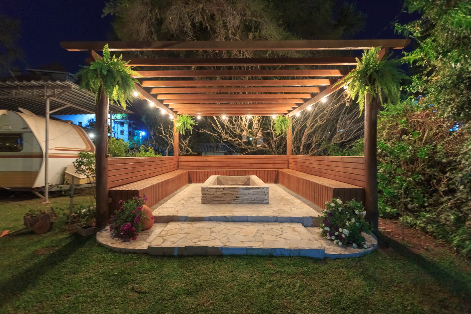 Illuminated gazebo with fireplace at night